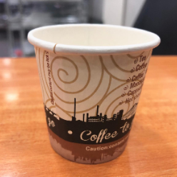 Paper cup with coffee label